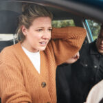 Couple Involved In Car Crash With Female Driver Suffering With Whiplash Injury Couple Involved In Car Crash With Female Driver Suffering With Whiplash Injury